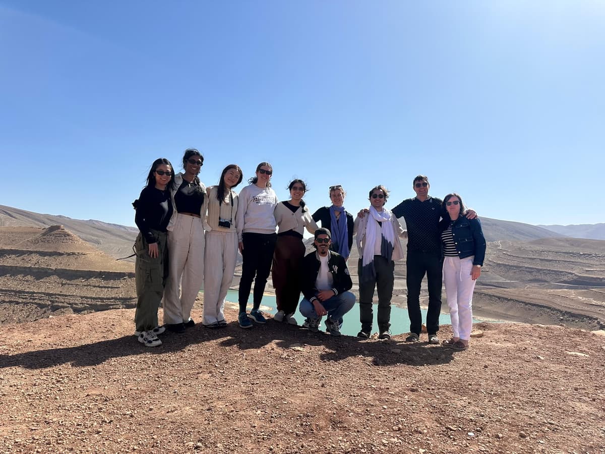 Group of happy travelers on a Marrakech Package desert tour